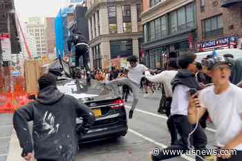 Thousands Overwhelm New York's Union Square for Streamer Giveaway, Tossing Chairs and Pounding Cars