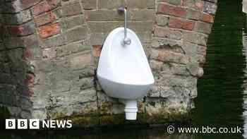 Urinal appears on the side of Sonning bridge over River Thames