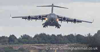 Birmingham Airport runway dwarfed by military plane in 'unusual' sight