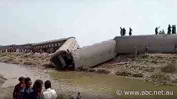 At least 25 killed in Pakistan train derailment in country's south