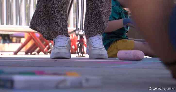 Social justice group hosts peace chalk art event in Santa Fe
