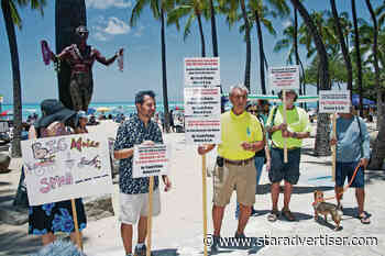 Waikiki residents rally for passage of law banning early trash pickups