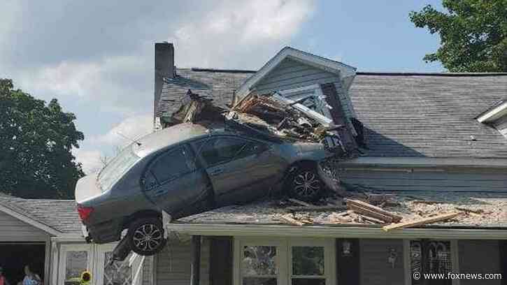 Pennsylvania driver hospitalized after bizarrely crashing car into second floor of home
