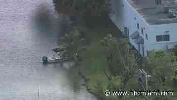 MDPD divers search for several dozen vehicles submerged in Doral lake after receiving reports