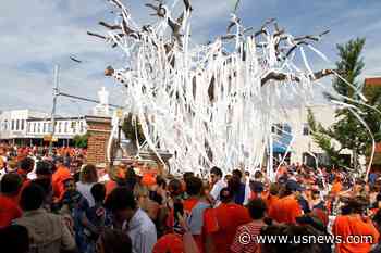 Celebrating Auburn Fans Can Once Again Heave Toilet Paper Into Toomer's Oaks
