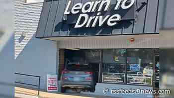 Employee plows through front of driving school