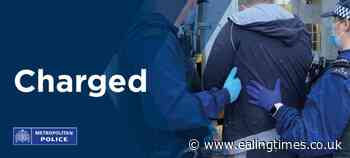 Woman charged after body found in canal at Southall