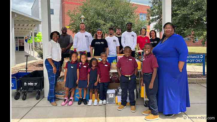 225 Mustang Mafia gives out free school supplies at Claiborne Elementary School