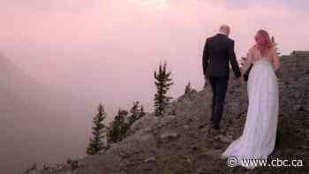 Newlyweds spend their wedding night at the top of broken down Banff Gondola
