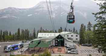 ‘Slept in my wedding dress’: Couple spends wedding night on mountain after Banff gondola breakdown