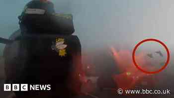 Motorcyclist captured driving through powerful storm