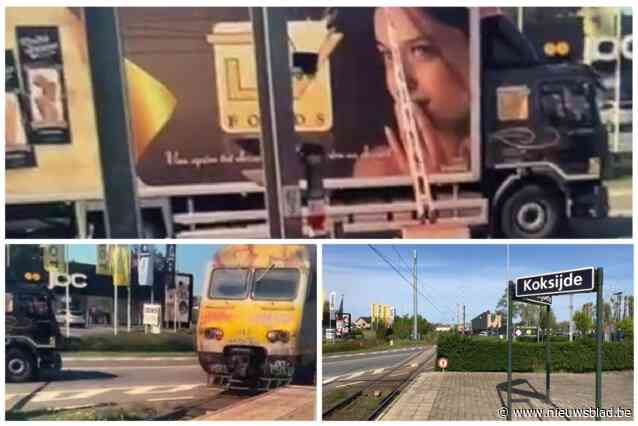 Infrabel reageert op opmerkelijke beelden van vrachtwagen klem onder slagboom: “Laat overweg áltijd vrij