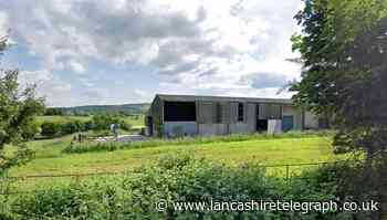 Plans for five homes in old farm building near Barnoldswick