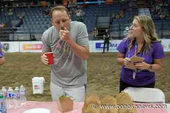 Hot dog champ Chestnut downs 304 mini doughnuts in 8 minutes