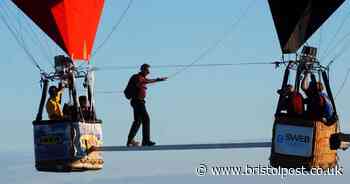 Bristol Balloon Fiesta's jaw-dropping stunts including blindfolded man walking on tightrope between balloons