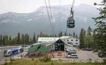 B.C. newlyweds spend their wedding night at the top of broken down Banff Gondola
