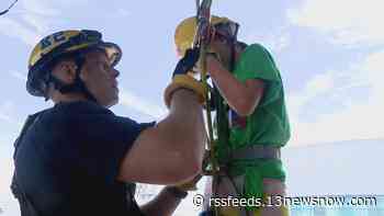 Girl Scouts learn the ropes of rappelling and other lifesaving skills at Norfolk camp