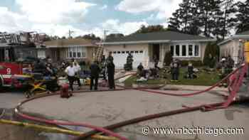 3 firefighters injured, 1 critically, in Norwood Park house fire