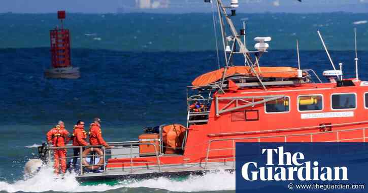 At least six dead and 50 rescued after small boat trying to cross Channel capsizes