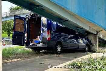Van damaged after crash into a Romford pedestrian overpass