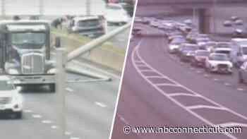 Crash and debris in road closes parts of both sides of I-84 in Hartford