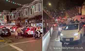 Cruise driverless cars block San Francisco street after 'TEN' of the vehicles suffered Wi-Fi failures 'caused by music festival'