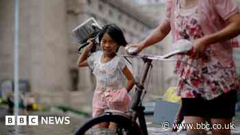 China floods: The families torn apart by 'huge, furious waves'