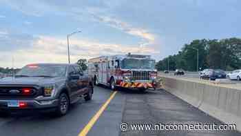 Fire truck struck by vehicle while on scene of car fire on I-95 North in Fairfield