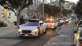 Self-driving cars block roads in San Francisco. subscription