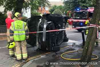 Woman trapped in overturned car rescued in Hornsey Lane