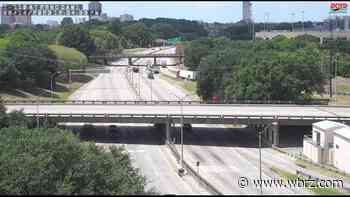 Car hauler spills flattened vehicles onto I-110 in Baton Rouge