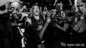 Atikamekw fans gift beaded medallions to Metallica bassist Robert Trujillo