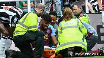 Tyrone Mings: Aston Villa defender to have surgery on 'significant' knee injury
