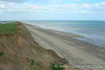 Two people forced to take refuge up cliff after tide cuts them off at Skirlington