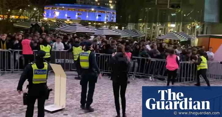 World Cup football fans barge through barricades to enter Federation Square fan zone