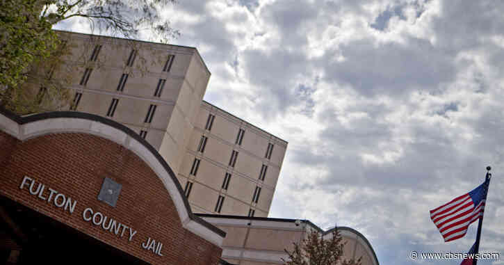 Trump expected to be booked at Fulton County Jail, sheriff says