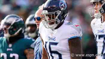 Titans' Burks carted off with apparent leg injury