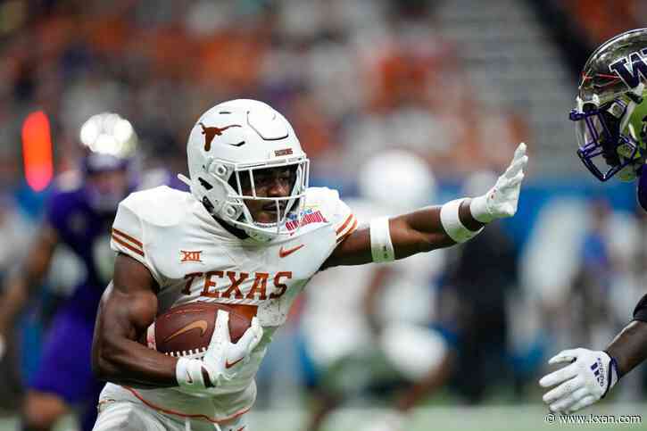 With a wide-open competition, Longhorns are buying into running back by committee