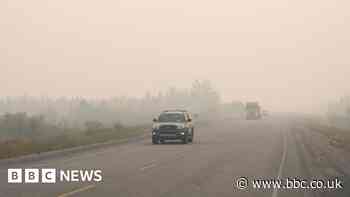Canada wildfire: Car 'began melting' as family evacuated north