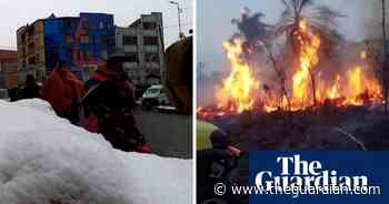 Snow falls in west of Bolivia in same week as wildfires in scorched east – video