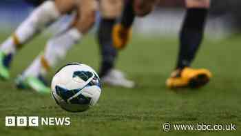 Footballers end game after player 'racially abused'