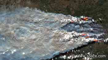 Satellites watch wildfires rage across Canadian northwest (photos)