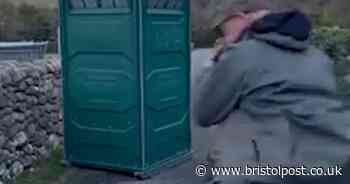 Video shows random portable loo found in middle of road blocking traffic