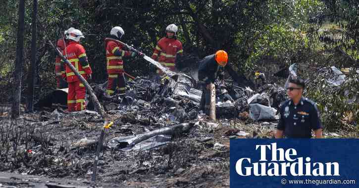 Ten killed as light plane crashes on street in Malaysia