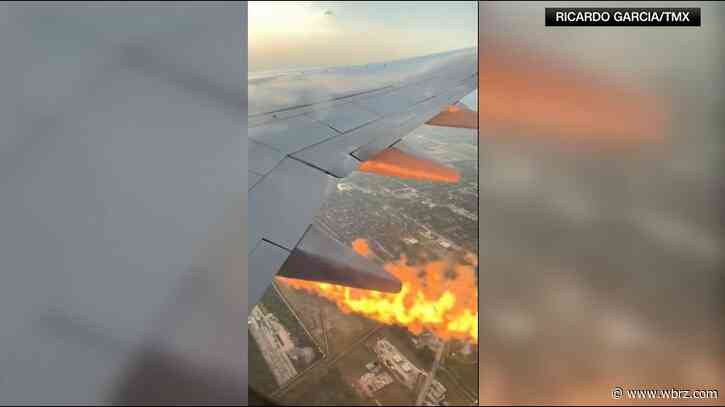 Videos show flames from engine of plane that returned to Houston airport after takeoff