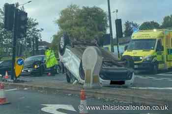 Car overturned in Romford crash which injured woman