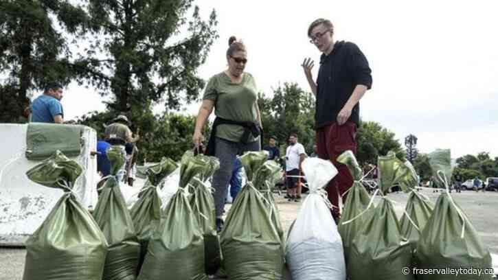 Hurricane Hilary downgraded to Category 2 as Mexico and California brace for catastrophic impact