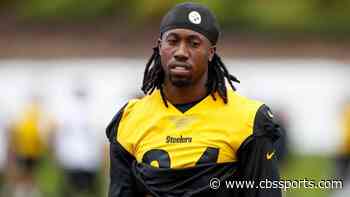 LOOK: Steelers' Joey Porter Jr. presents Joey Porter Sr. with game ball after his first career interception