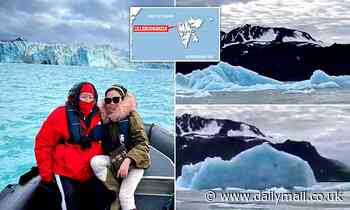 Incredible moment iceberg breaks up and flips over next to daring tourists