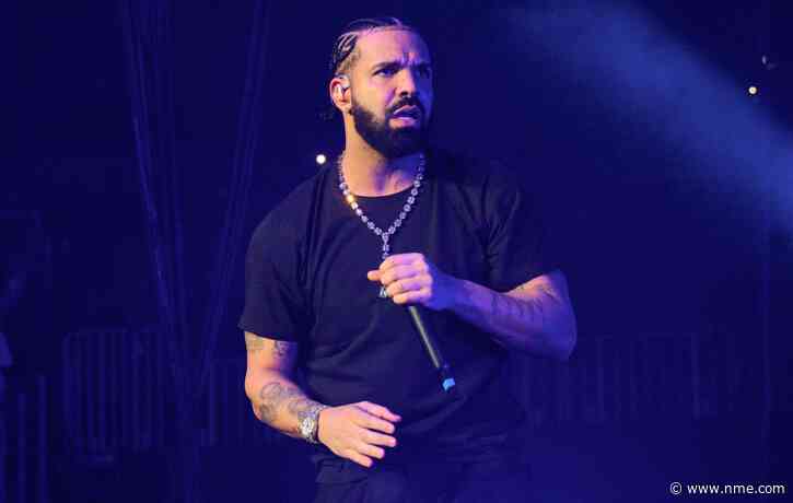 Drake hits out at fan for throwing book at his head onstage